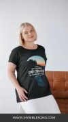 Beautiful young woman wearing a Christian-themed T-shirt promoting God's creation and the Bible, perfect for online Bible lesson sites and Christian music promotion sites.