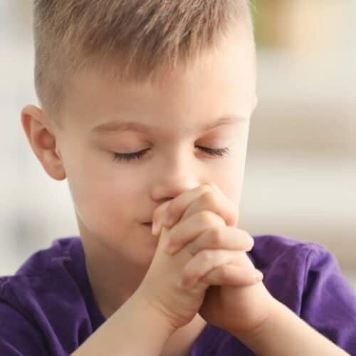 32 Inspiring Billy Graham Quotes on Prayer That Will Transform Your Spiritual Life My Bible Song 2025 Prayerful young boy with hands clasped in prayer, Bible song, Christian faith, children praying, religious devotion, spiritual practice, worship, infant prayer, devotion, peaceful faith act, Christian worship, inspirational faith moment.