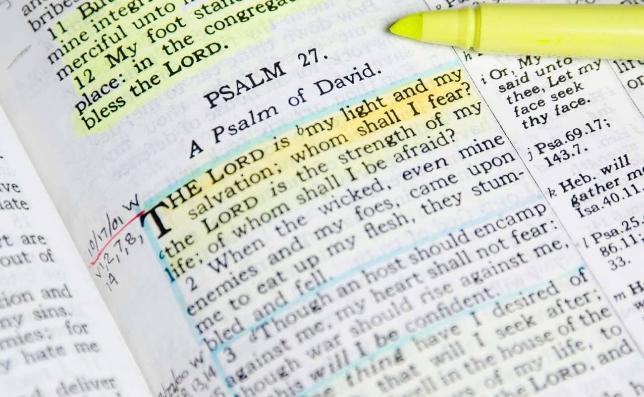 Psalm 27 highlighted in the Bible with the verse about God's light and salvation.