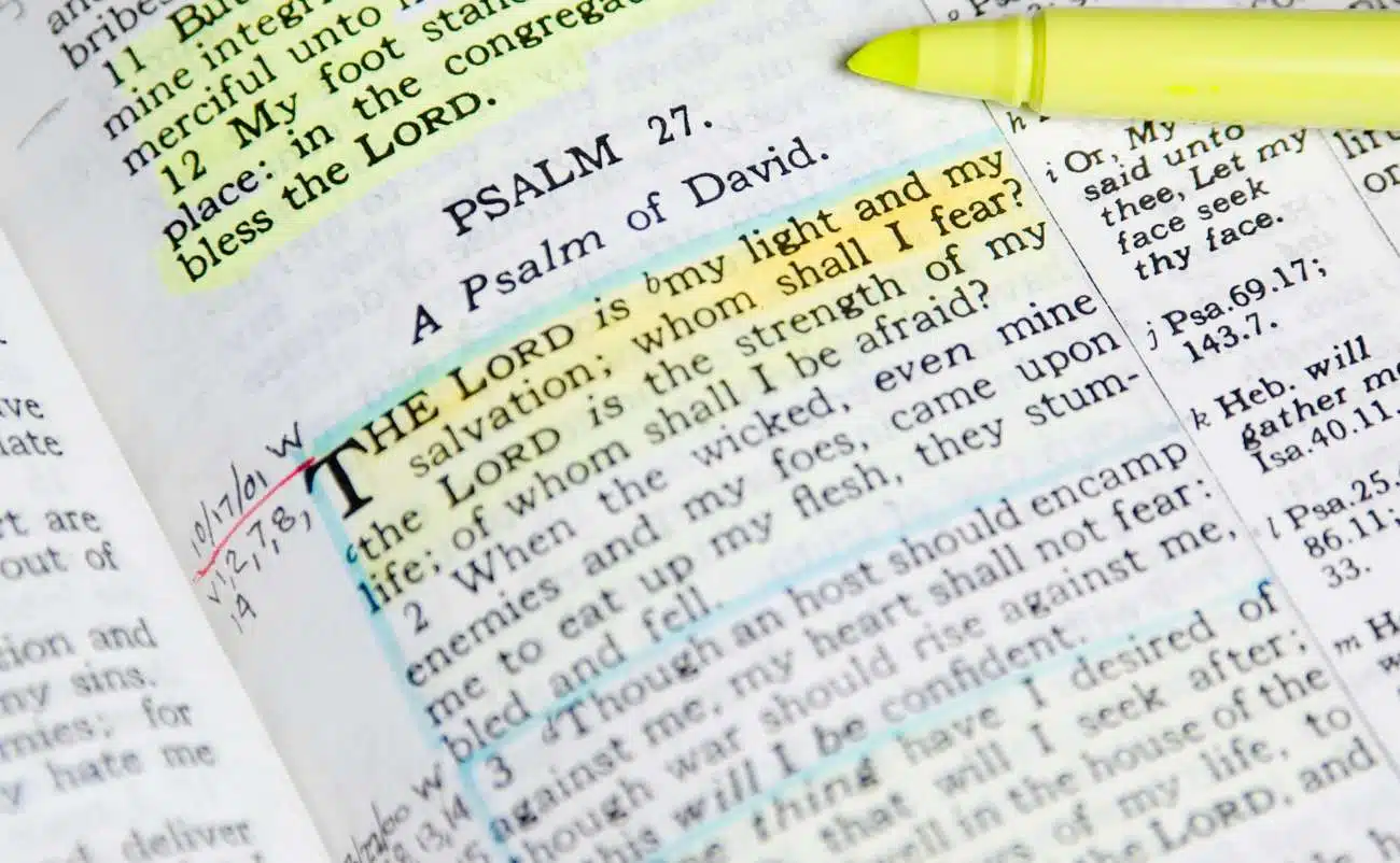 Psalm 27 highlighted in the Bible with the verse about God's light and salvation.