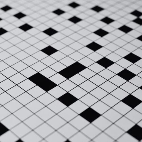 Black and white crossword puzzle grid with a motivational message.