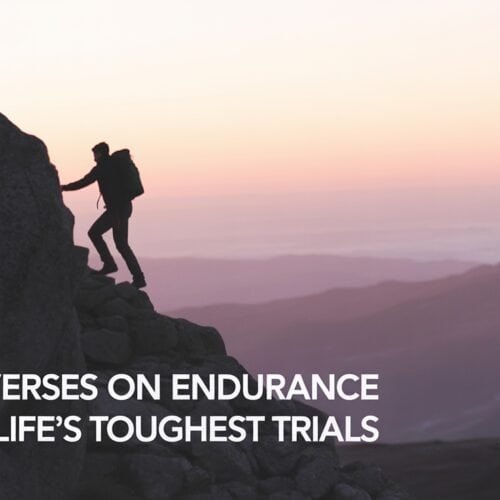 Climber ascending a rocky mountain at sunrise, symbolizing spiritual endurance and perseverance.