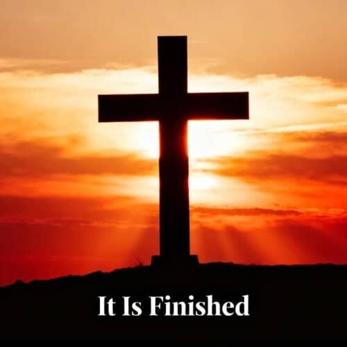 Cross silhouette at sunset with the phrase "It Is Finished" referencing biblical themes and Christian faith.