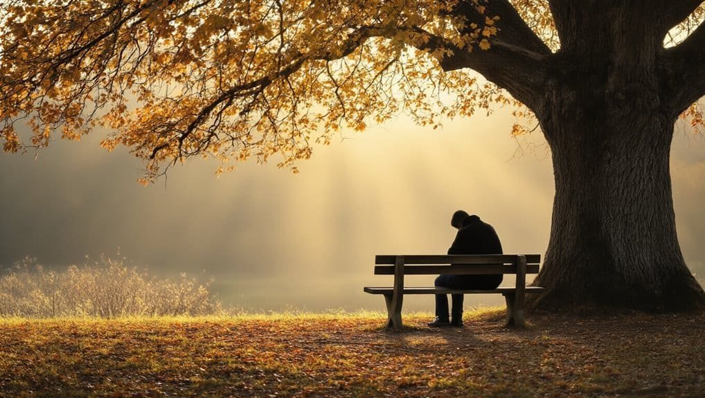 Peaceful man sitting on a bench under a large tree with autumn leaves, feeling spiritual and contemplative, reflecting the calming and faith-inspired themes of My Bible Song.