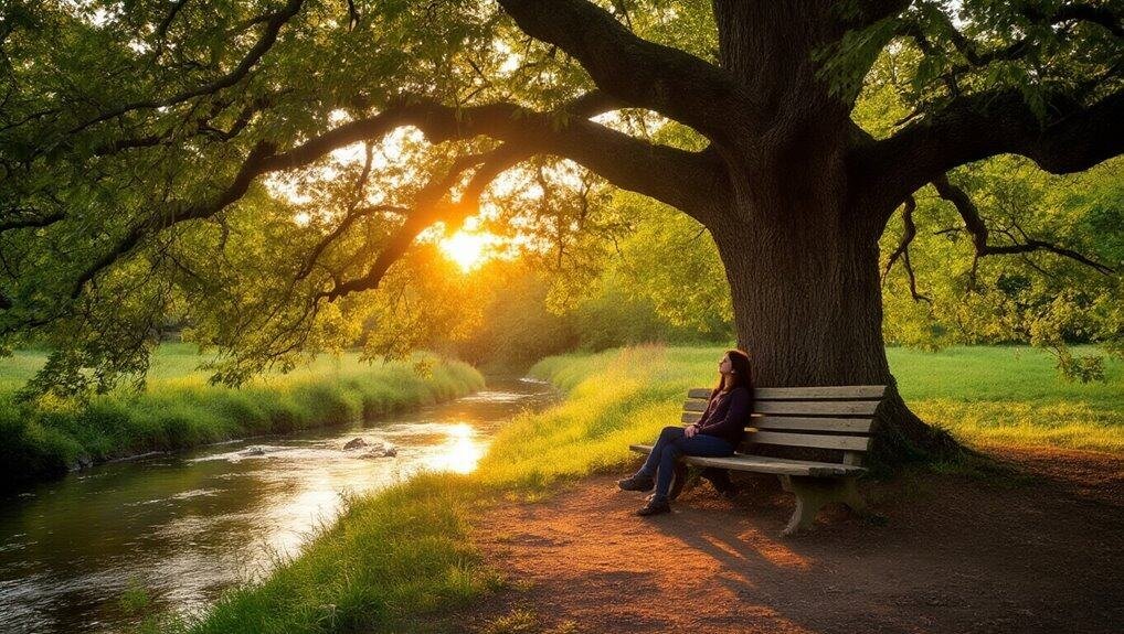 Bible Verses for Trusting God in Difficult Times My Bible Song 2026 Serene outdoor scene with a woman sitting on a bench beneath a large tree by a peaceful river during sunset, perfect for promoting relaxation and reflection through biblical songs.