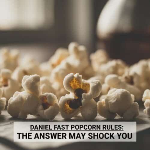 Popcorn on a surface with a background of a Bible song website, symbolizing entertainment and spiritual connection.